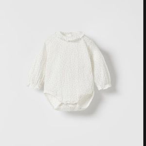Textured ecru body suit